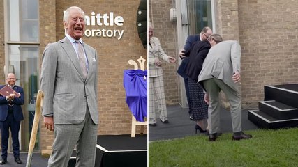 Watch: King Charles helps woman whose shoe gets stuck during Cambridge University visit