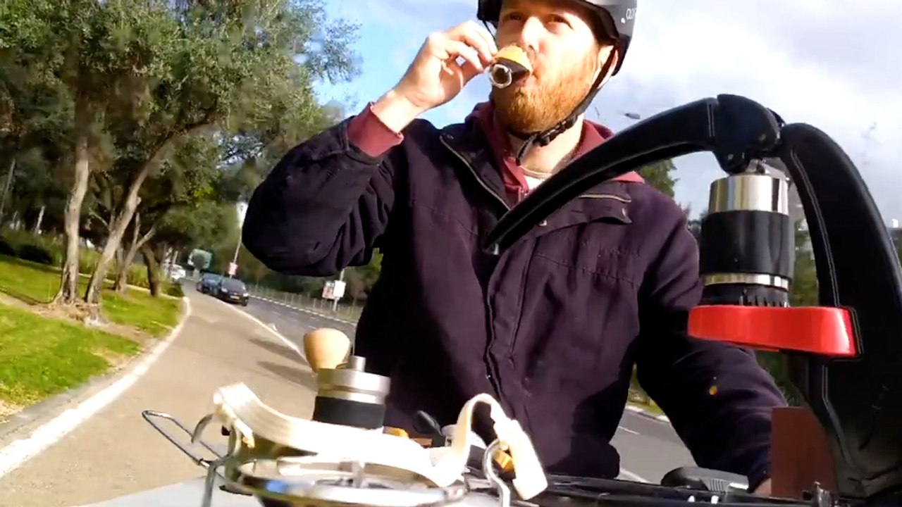 Caffeine on Wheels: Bike-riding Barista Brews Espresso with Flair!