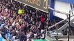 QPR fan having a bit of fun with a flag dropped by the Bristol City fans in the top tier  Wait till the end