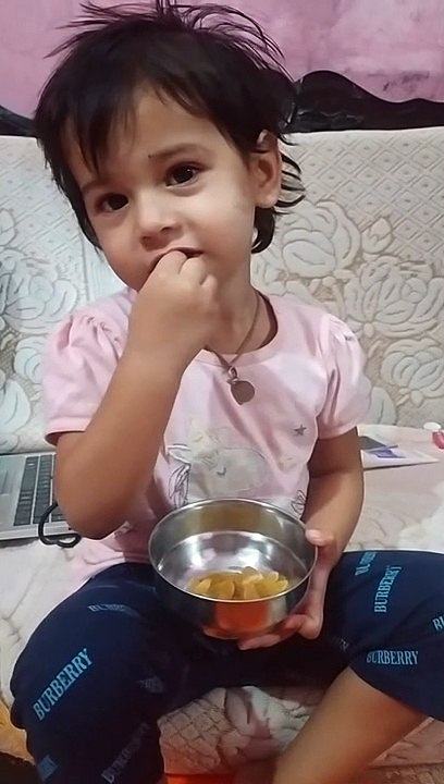Cute Trishu eating kishmish & sating her sister is sleeping -dm