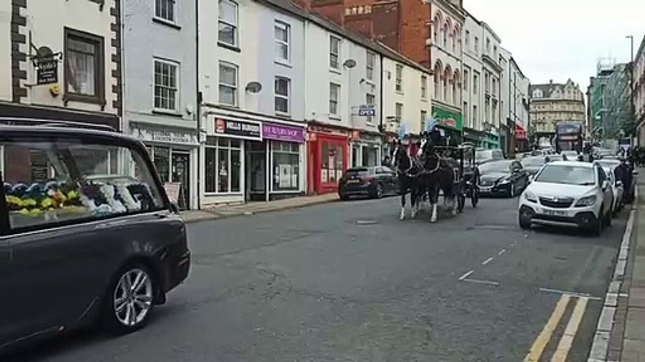 Horse-drawn carriage at Fred Shand's funeral in Northampton on Friday May 12