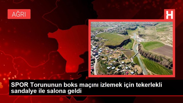 SPOR Torununun boks maçını izlemek için tekerlekli sandalye ile salona geldi