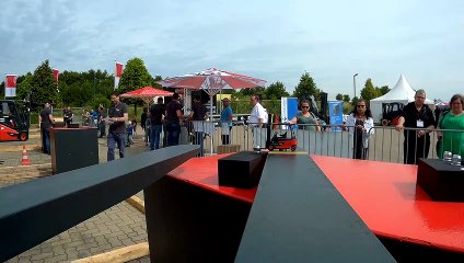 Big Forklift Uses Tiny Forklift With Incredible Precision