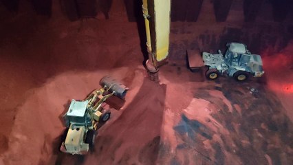 The man who drives the giant grader as if it were a toy.