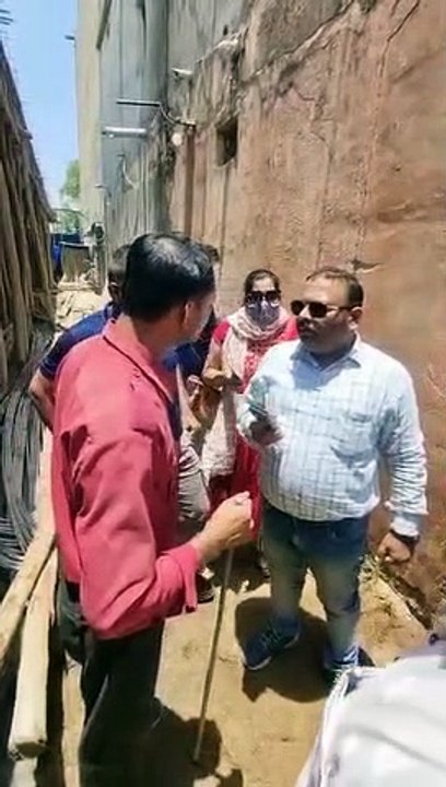 NAPA workers arrived to remove illegal construction, pushed, couple sitting in front of the machine