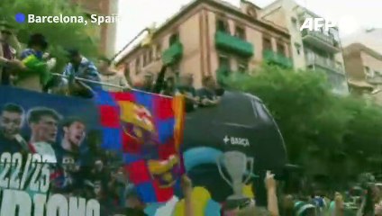 FC Barcelona celebrate La Liga titles with parade through city centre