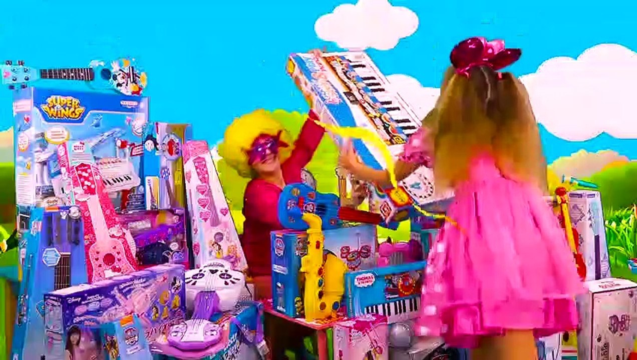 Sasha plays Toy Guitar Music Challenge and sing Kids Nursery rhymes Songs