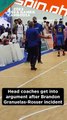 LOOK: Coach Chot Reyes and Cambodia coach having an exchange as Gilas men cater to Brandon Ganuelas-Rosser on the floor