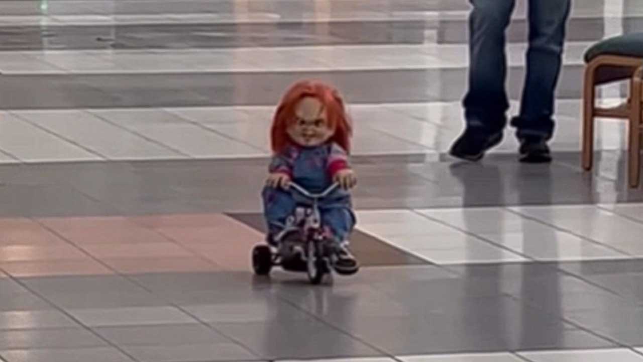 People at mall FREAK OUT on seeing creepy Chucky doll riding a tricycle