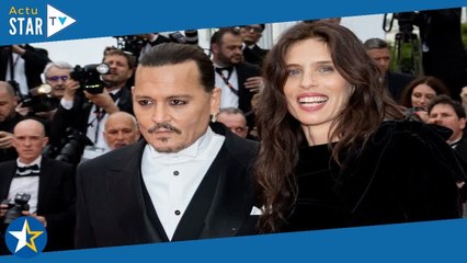 Johnny Depp : queue-de-cheval et lunettes noires, l'acteur accueilli en rock star par le public de C