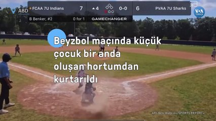 Beyzbol maçında küçük çocuk bir anda oluşan hortumdan kurtarıldı