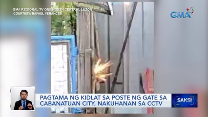 Download Video: Pagtama ng kidlat sa poste ng gate sa Cabanatuan City, nakuhanan sa CCTV | Saksi