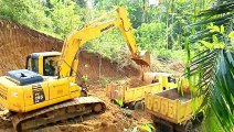 Strength and Precision Komatsu PC 195 LC Excavator Loading Dump Truck