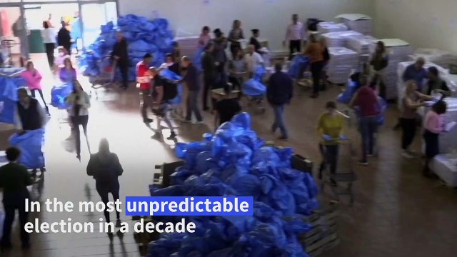Workers distribute ballots ahead of unpredictable Greek elections