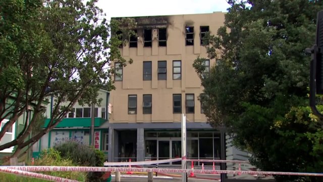 Man arrested and charged over fatal wellington hostel fire