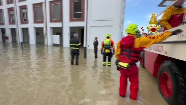 Italy floods: Firefighters deliver food to patients as hospital surrounded by water