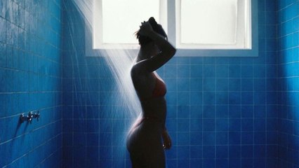 Emily Ratajkowski Wore a Cheeky Orange Bikini to Announce Her New Swimwear Collab