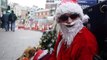 Alex has been sleeping rough in London for 9 years. He dresses up as Santa to panhandle.