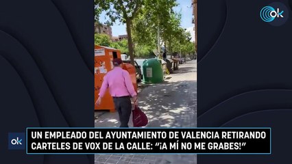 Un empleado del Ayuntamiento de Valencia retirando carteles de Vox de la calle: "¡A mí no me grabes!"