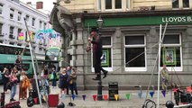 Only in Brighton! Classic Beatles on a tightrope... with a violin...