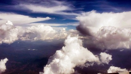 mixkit-clouds-and-blue-sky-background-2408