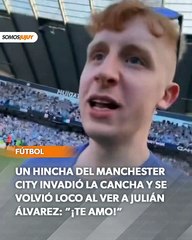 Julián Álvarez con un hincha del Manchester City