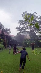 Giggling Together In The Rain