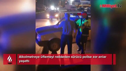 Alkolmetreye üflemeyi reddeden sürücü polise zor anlar yaşattı