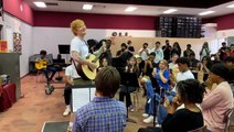 High school band plays ‘Eyes Closed’ to Ed Sheeran as he surprises them with free guitars and tickets