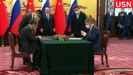 Russian PM arrives in China for business forum, talks with Xi video