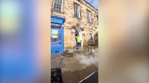 Window cleaner becomes online sensation after pressure washing his hometown's filthy pavements in his spare time