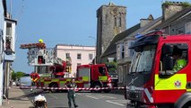 Fire crews assisting removal of a casualty in Pembroke Dock