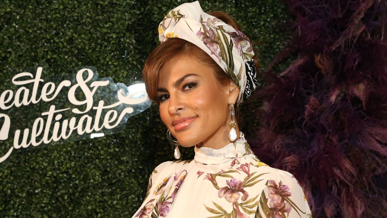 Eva Mendes Looked Like a Modern-Day Marilyn Monroe in a Plunging, Backless White Dress