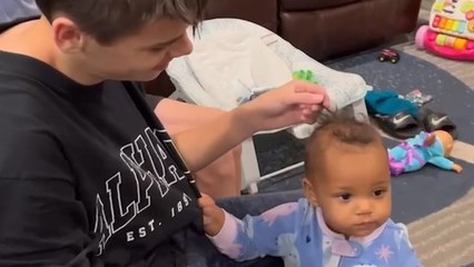 SASSY little Sister makes it clear which Brother is her favourite!