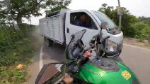 Biker's Helmet Cam Captures Close Call With Truck
