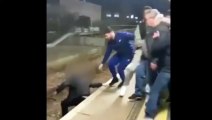 Moment Football Fan Fight Railway Track mass brawl breaks out between Tottenham _ Arsenal supporters