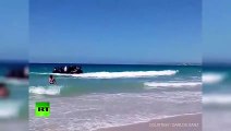 Spanish tourists shocked as dinghy full of migrants lands on shore