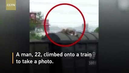 Man climbs onto train to take photo, gets serious burns after touching high voltage wire