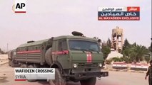 Russian Military Vehicles Cross Into Douma