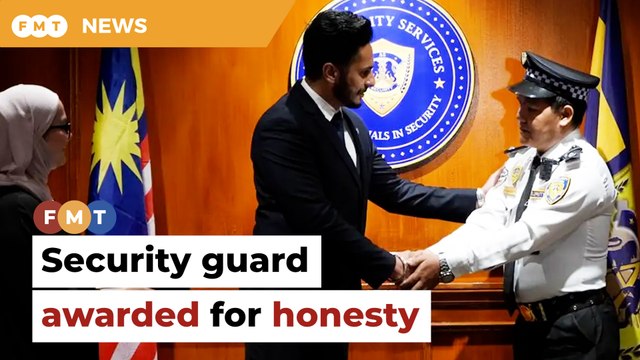 Award for security guard who turned in money-filled bag HD