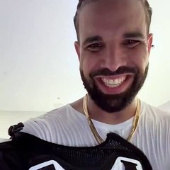 Drake shows off the amount of sweat he pours off after concert