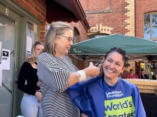 Premier Jacinta Allan takes to aide with scissors