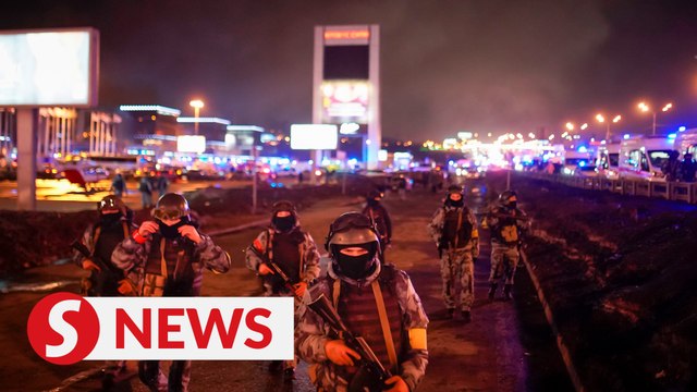 Islamic State claims responsibility for Moscow terror attack, investigators say over 60 victims dead