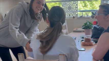 Woman brings mom to the verge of crying happy tears with her surprise return from abroad