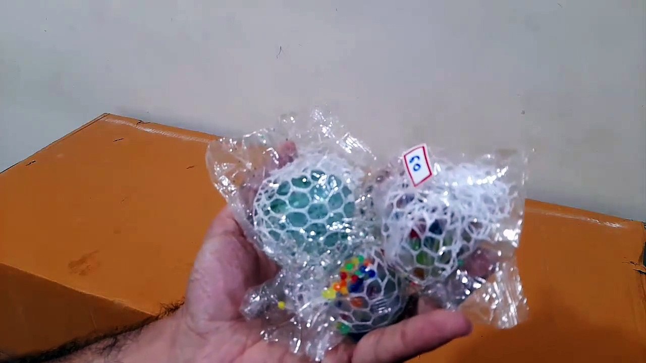 What's inside Squishy Mesh Ball Stress Relief Hand Fidget Toy - video ...