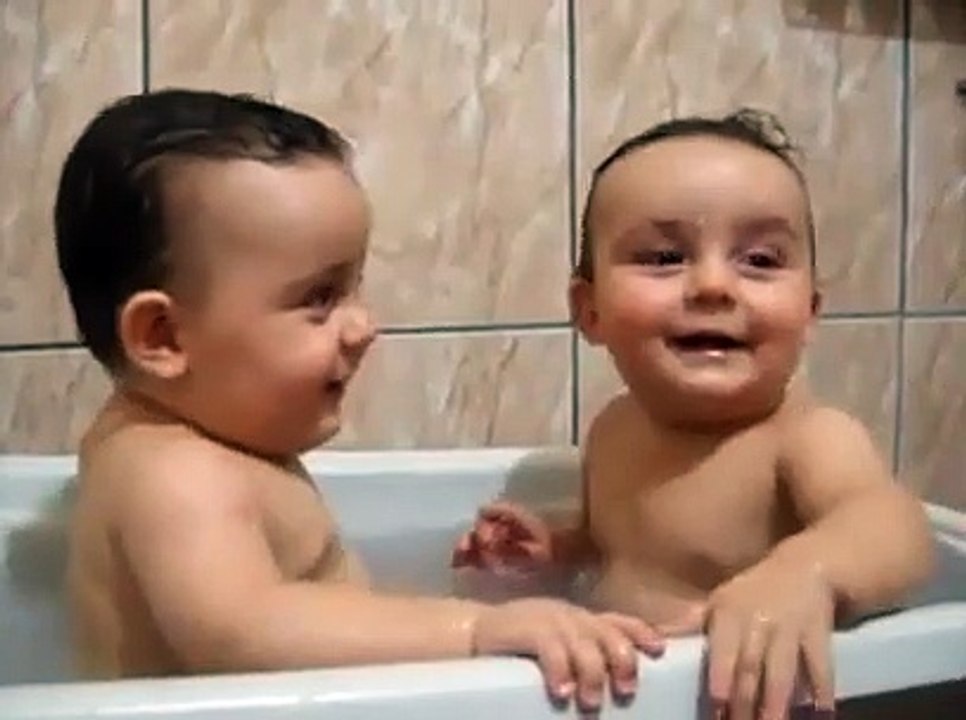 Twins Brothers Enjoying Bath Time