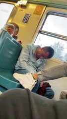 Sleeping Man on Train Falls Out of His Chair