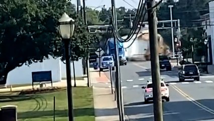 Dramatic moment truck is obliterated by oncoming train