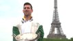 Djokovic showcases French Open trophy in Paris