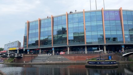 Pro golfer Richard Mansell attempts a trick shot off the roof of Utilita Arena Arena Birmingham ahead of the Betfred British Masters